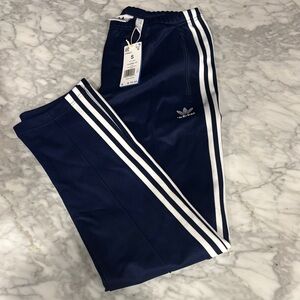 Adidas men’s Blue Joggers with White Stripes